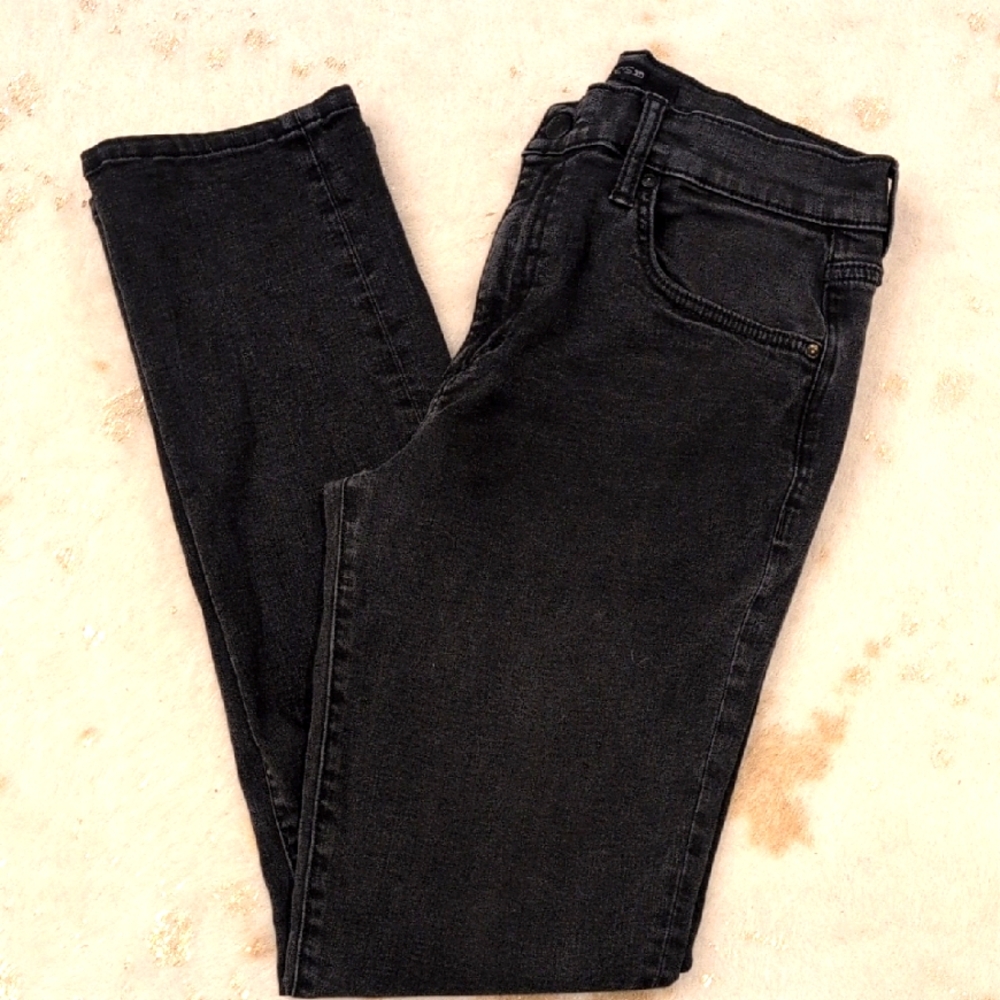 Joe's Jeans in a distressed black. 32x32